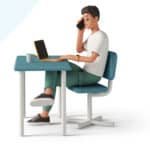 An employee sitting working without taking breaks